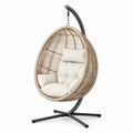 Sedia sospesa ovale in rattan sintetico con cuscini beige